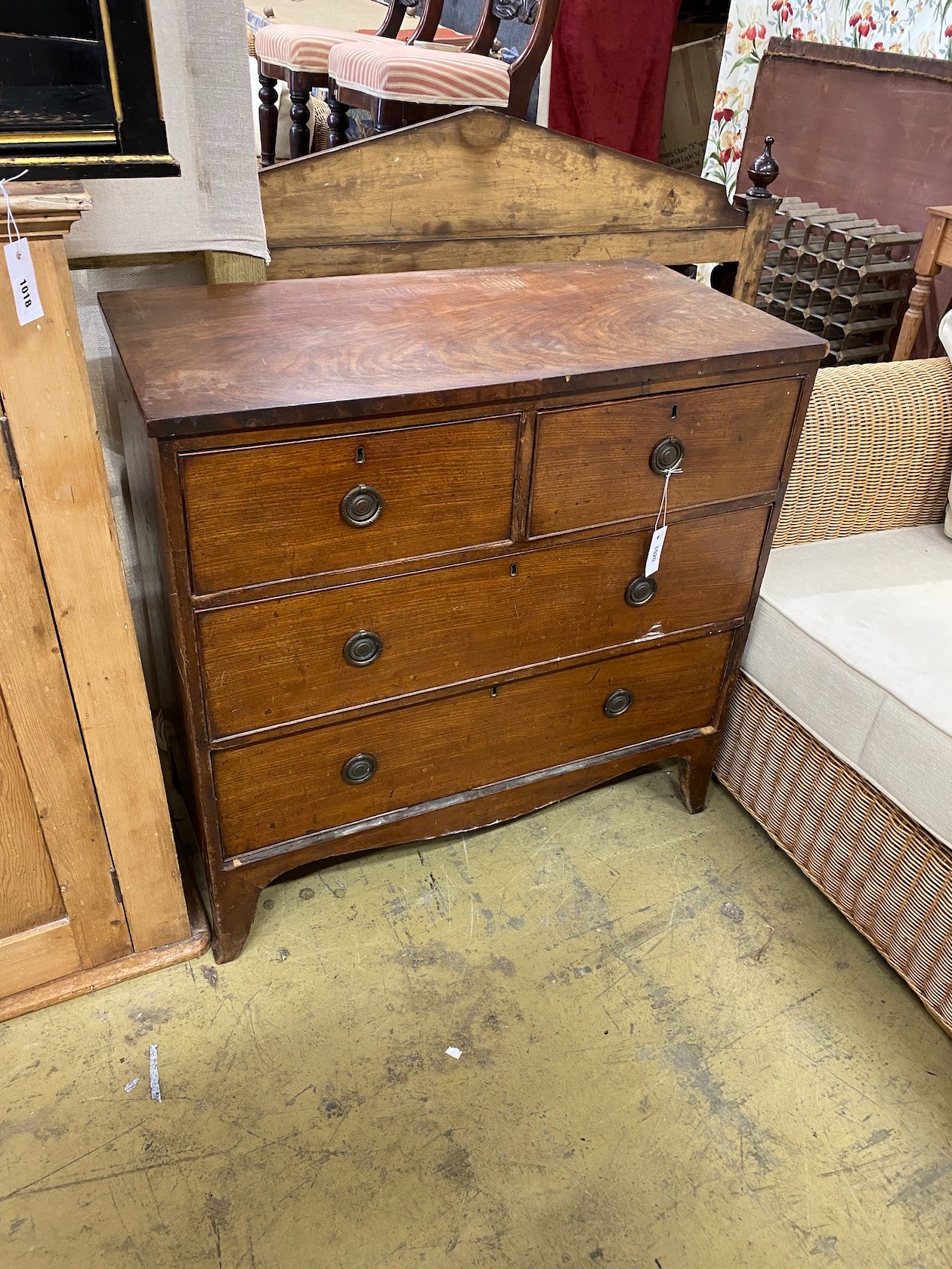 A small early Victorian four drawer chest with original brass ring handles width 89cm, depth 46cm, height 87cm